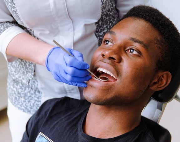Man receiving dental checkups to prevent dental emergencies