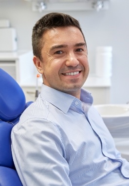 Man with healthy smile after preventive dentistry