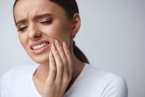 woman with severe toothache 
