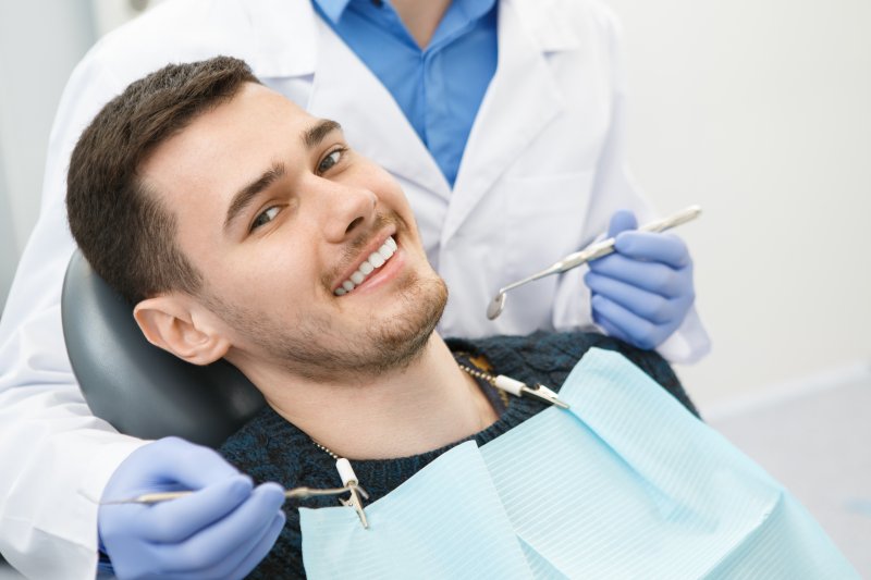 a man undergoing a dental exam in Chardon