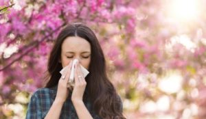 A woman with seasonal allergies in Chardon 